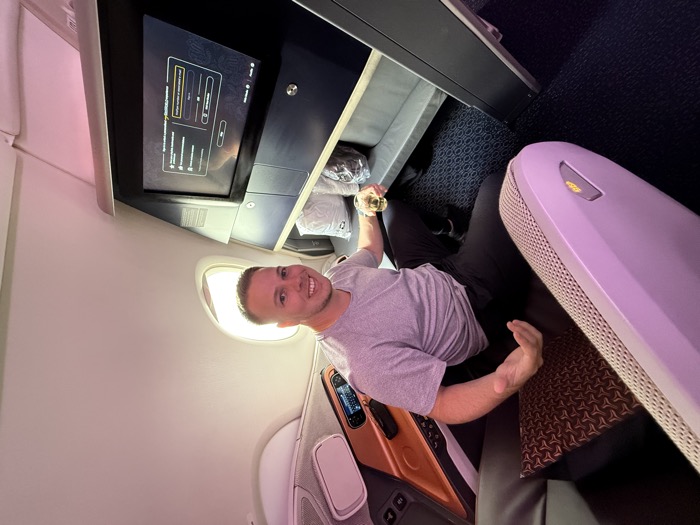 Business class suite with entertainment screen