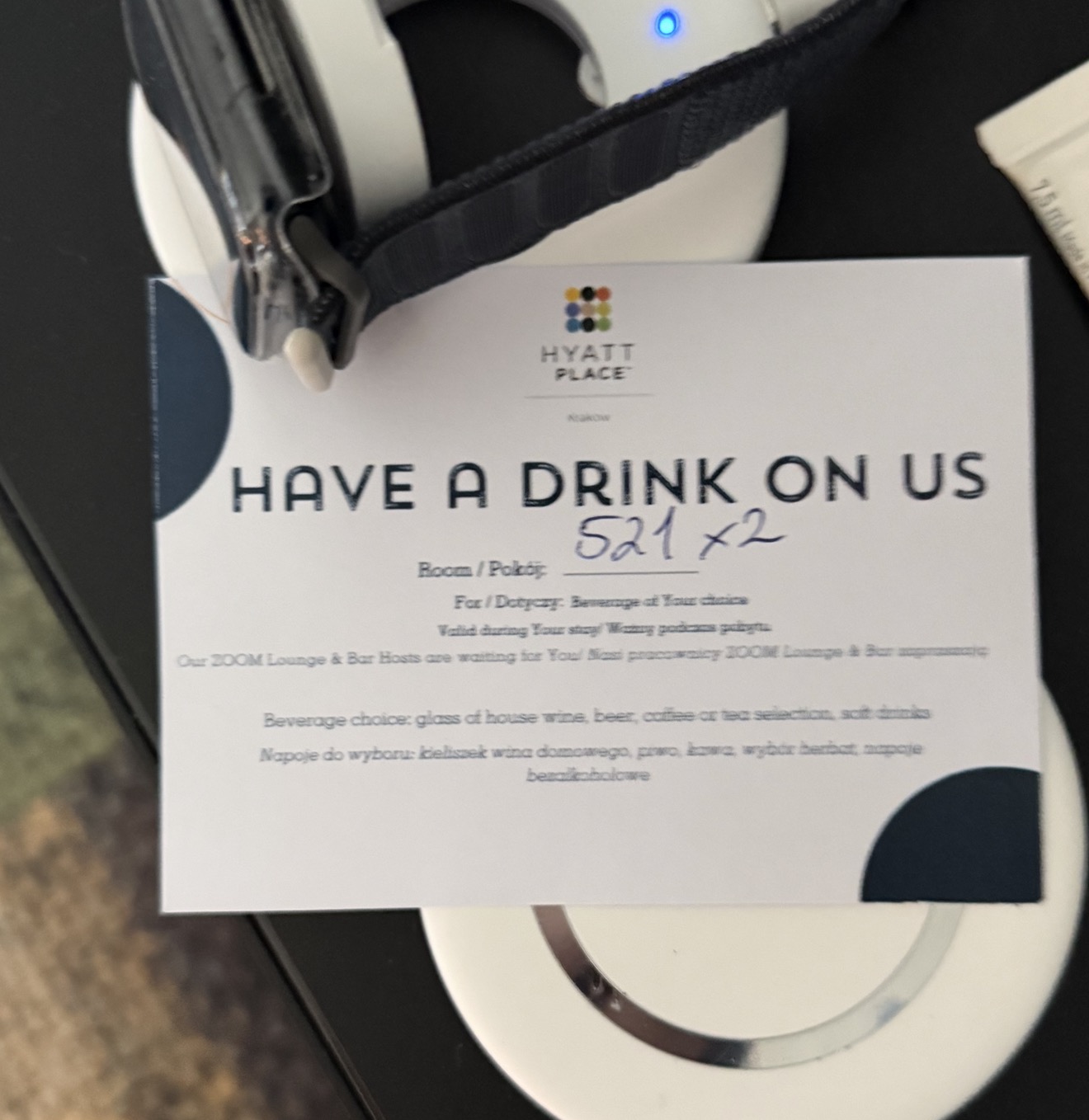 The Have a Drink on Us card left for room 521 at Hyatt Place Kraków, marked for two drinks