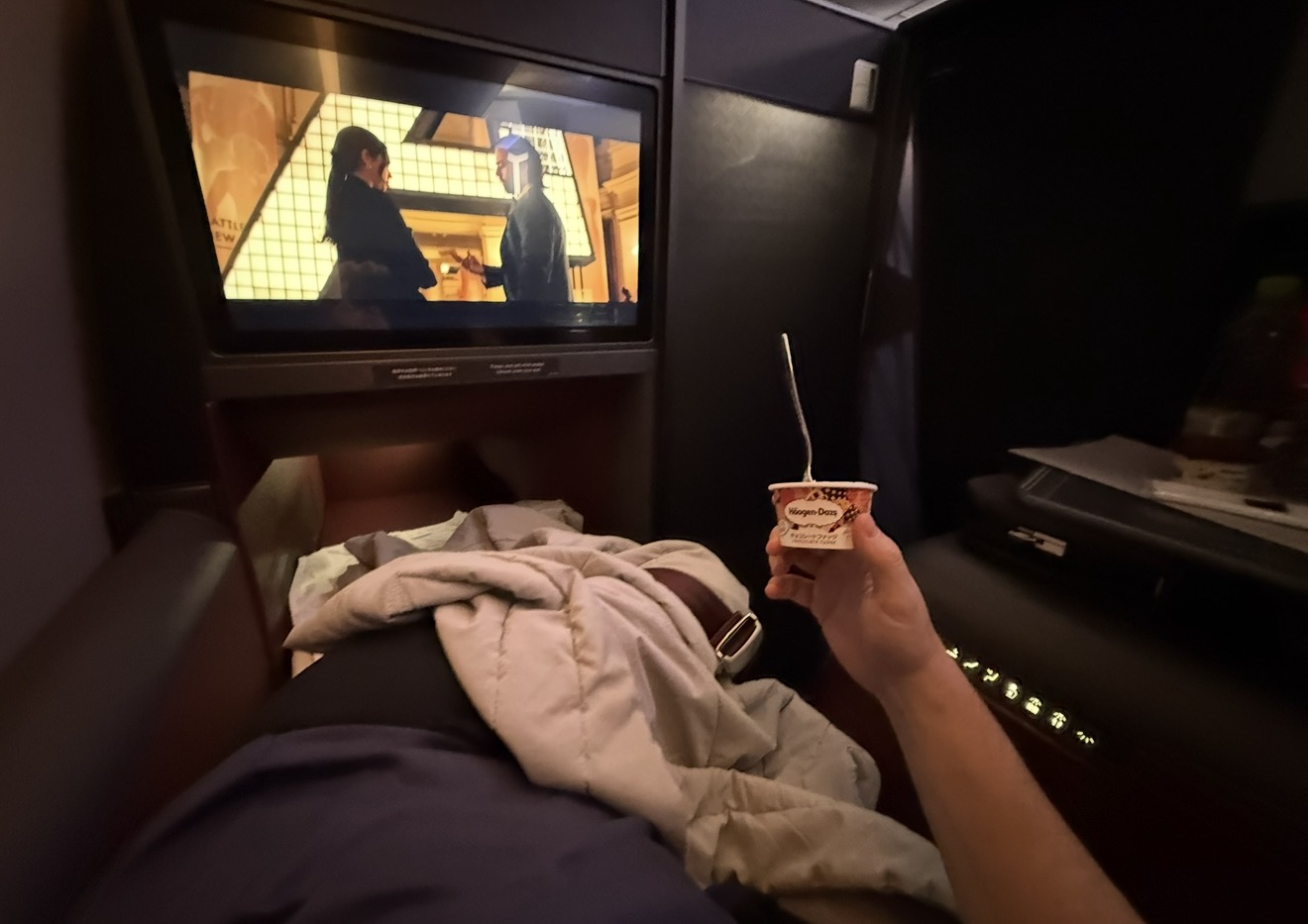Haagen-Dazs ice cream and a film before sleeping in JAL business class