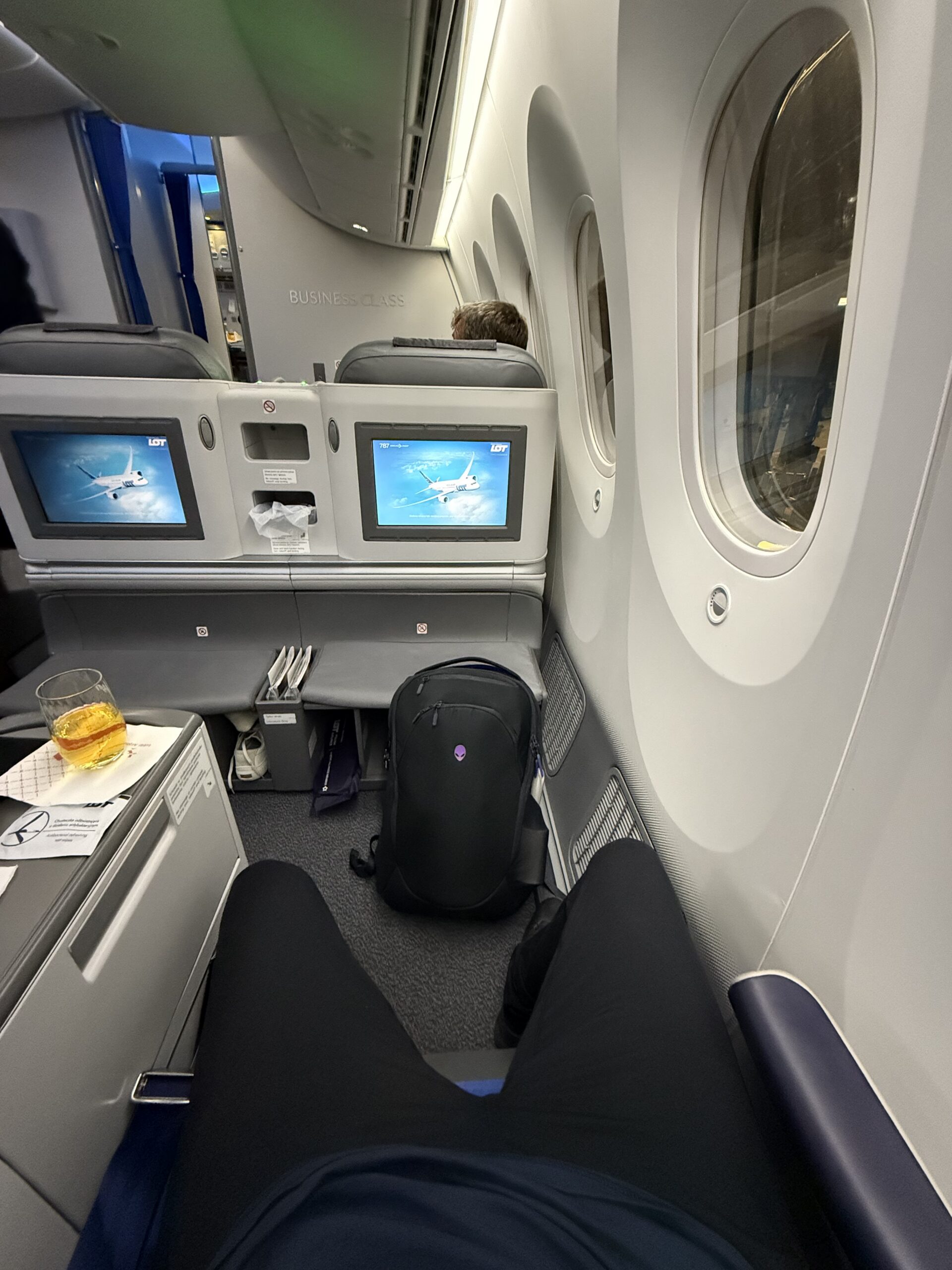 LOT Polish Airlines 787 business class cabin in a 2-2-2 layout with screens set into the seat shells